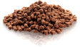En bunke ESSENTIAL Motivation delights 500g - lækre træningsgodbidder på sort baggrund, perfekt til Essential delights eller træningsgodbidder.