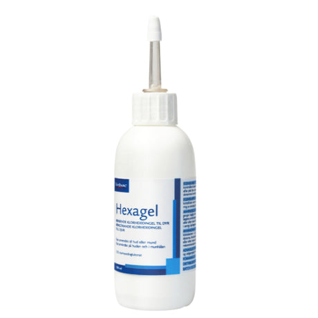 En flaske osmedkaeledyr.dk Virbac Hexagel til hunde og katte, 100 ml, en rensegel til forebyggelse af plak og rensning af uren hud, fotograferet på hvid baggrund.