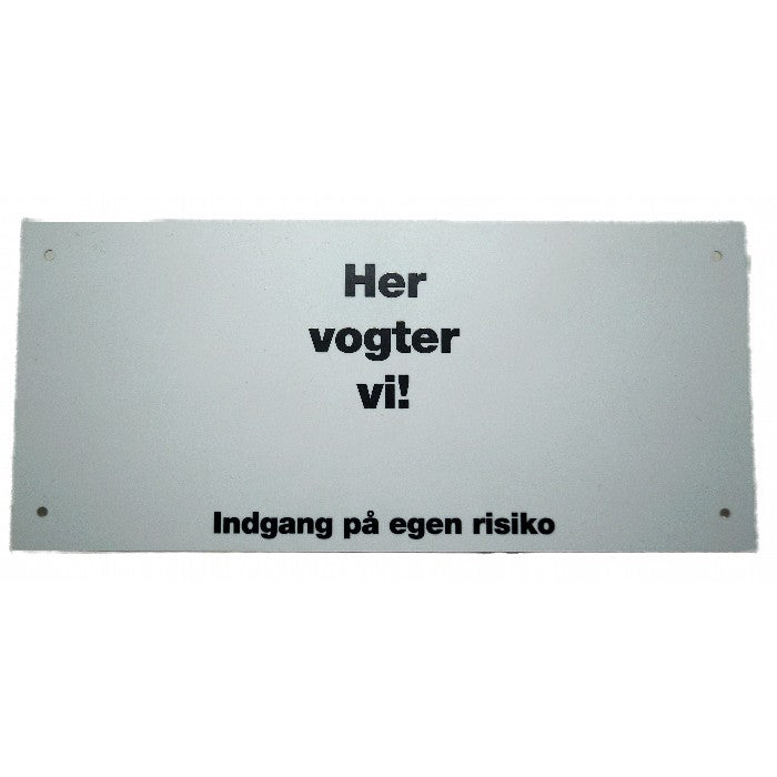 Et Kw skilt, hvor der står "Her vogter jeg!