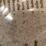 Et nærbillede af en Trixie terrarium sandpose.