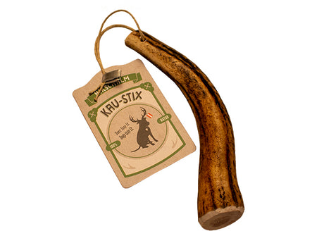 Et Tikki Kødben træhorn med et mærke på, perfekt til hundeelskere, der leder efter et naturligt touch.