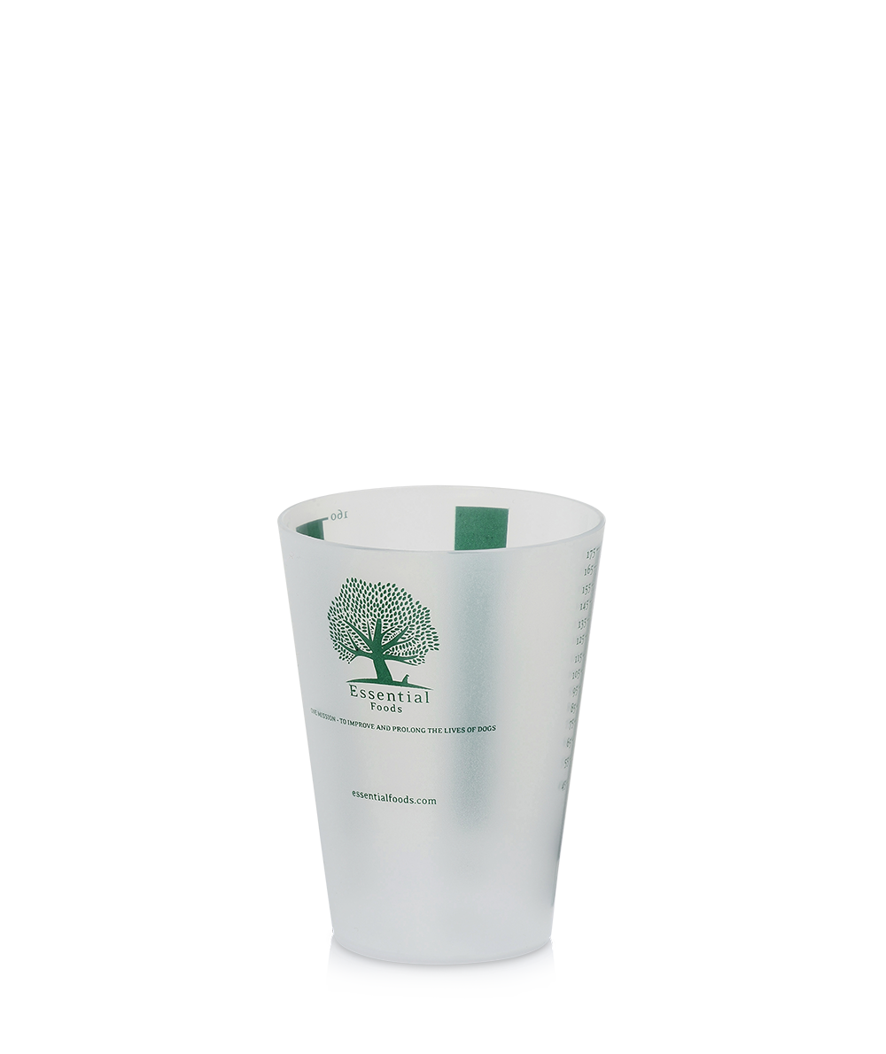 En hvid Målebæger med et grønt træ på, designet til madportionsmåling og godkendt til fødevaresikkerhed.