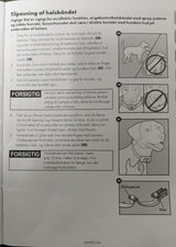 En PetSafe-bog med instruktioner om, hvordan man bruger en sele til en hund, herunder nyttige tips til brug af en Anti Gø halsbånd med spray fra PetSafe.