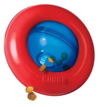 Et rødt og blåt Kong Gyro Foderbold legetøj med en bold i, der giver underholdning til hunde.