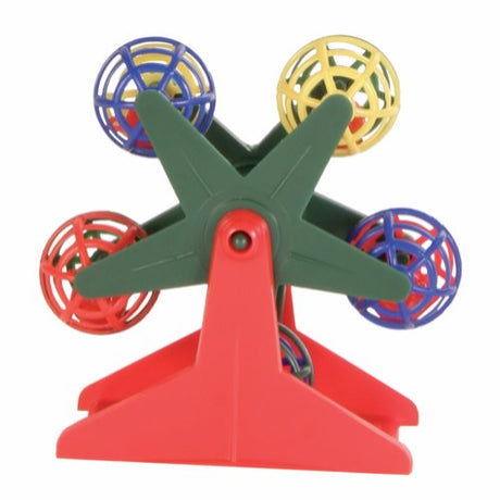 Et legetøj med farverige bolde på toppen af et rødt stativ. Trixie Aktivitetslegetøj til fugle, pariserhjul drejer blidt som møllen drejer rundt, der ligner et Pariserhjul.