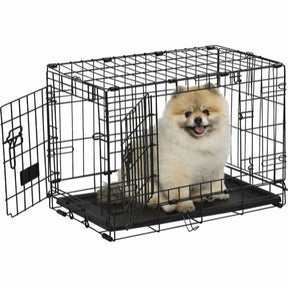 En Trixie foldbar hundekasse til nem transport, der rummer en pomeranian.