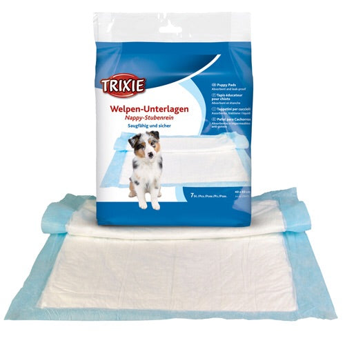 En pakke med Trixie kæledyrsservietter med en hund på, designet til Underlag til renlighedstræning af hvalpe, flere størrelser.