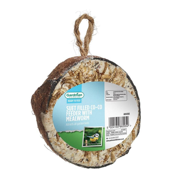 An image of a Kokosnød halv, med fedt og melorme til fuglene i haven with a rope at it, used as højenergi foder. Mærke: Gardman