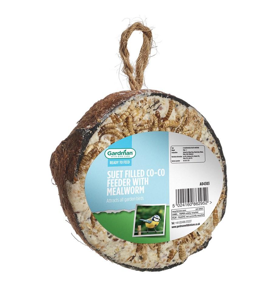 Kokosnød halv, med fedt og melorme til fuglene i haven