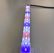 En Akvarie LED lys-strimmel med et blåt og lilla farveskema, der giver levende belysning, placeret på et bord.