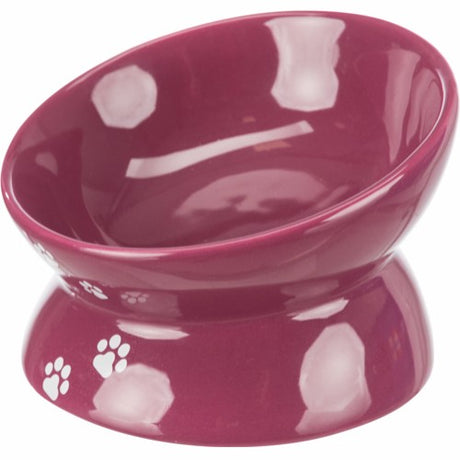 Beskrivelse: En rosa Mad- & vandskål til katte, Skrå forhøjet skål fra Trixie med potetrykk.