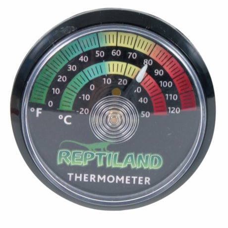 Et Trixie Termometer til terrarier, analog med ordet krybdyrland på, velegnet til terrariet. Den måler temperaturer fra -20 °C til 50 °C.