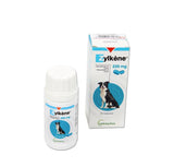 En æske Zylkene, et supplement til hunde, der oplever uro eller utryghed, ses med en hund ved siden af.